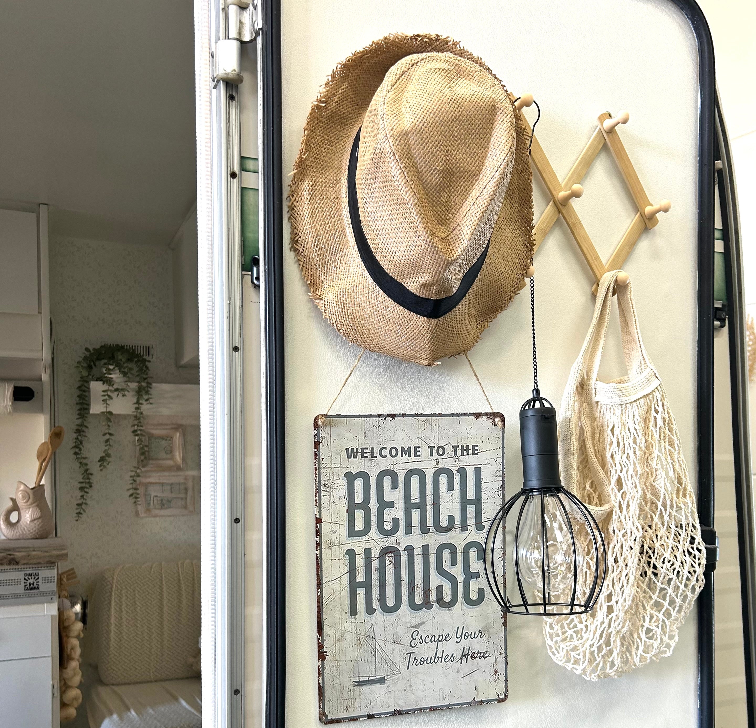 Vintage-Schild „Willkommen im Strandhaus“